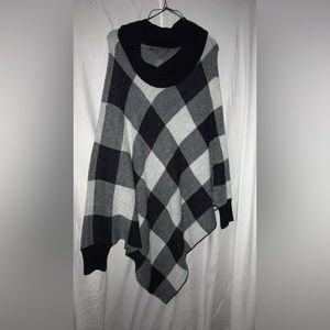 Sweater poncho with sleeves